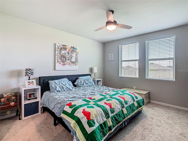 509 Mckenna Dr, Winter Haven, FL 33881 - bedroom with carpet floors and ceiling fan