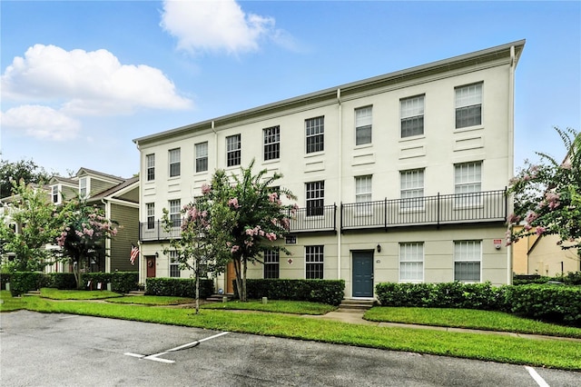 742 Centervale Dr Unit 742, Celebration, FL 34747 - view of property featuring uncovered parking