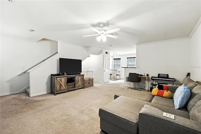 742 Centervale Dr Unit 742, Celebration, FL 34747 - living room with ceiling fan, stairs, light colored carpet, and crown molding