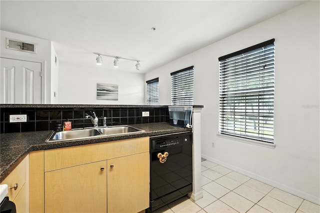 742 Centervale Dr Unit 742, Celebration, FL 34747 - kitchen featuring dishwasher, light brown cabinets, dark countertops, and decorative backsplash