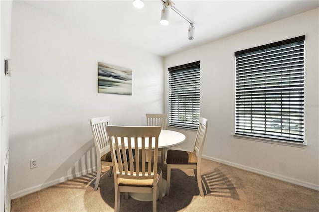 742 Centervale Dr Unit 742, Celebration, FL 34747 - carpeted dining space featuring baseboards
