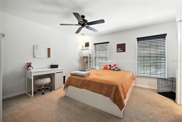742 Centervale Dr Unit 742, Celebration, FL 34747 - carpeted bedroom featuring baseboards and a ceiling fan
