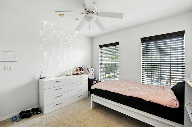 742 Centervale Dr Unit 742, Celebration, FL 34747 - bedroom with light colored carpet and a ceiling fan