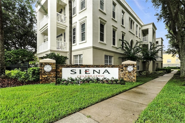 742 Centervale Dr Unit 742, Celebration, FL 34747 - community sign with a lawn