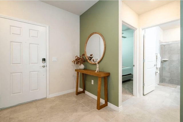 4254 Lana Ave, Davenport, FL 33897 - entryway featuring baseboards and light tile patterned floors