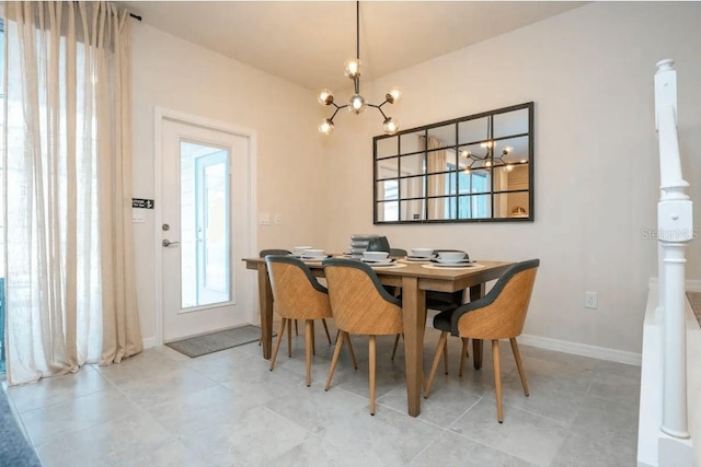 4254 Lana Ave, Davenport, FL 33897 - dining space with a chandelier and light tile patterned flooring