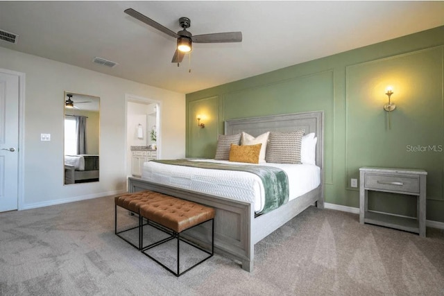 4254 Lana Ave, Davenport, FL 33897 - carpeted bedroom with ensuite bathroom and a ceiling fan