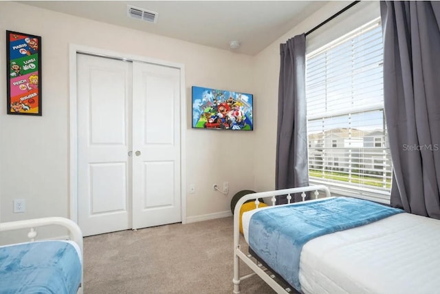 4254 Lana Ave, Davenport, FL 33897 - bedroom featuring light carpet and a closet