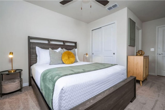 4254 Lana Ave, Davenport, FL 33897 - bedroom featuring light colored carpet, a closet, and a ceiling fan