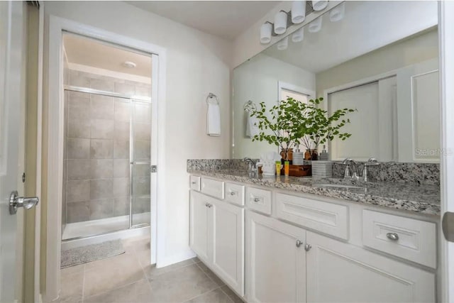 4254 Lana Ave, Davenport, FL 33897 - full bathroom with double vanity, a stall shower, and tile patterned floors