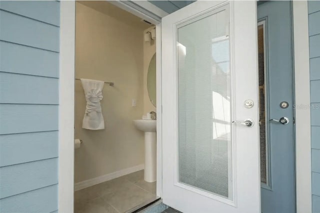 4254 Lana Ave, Davenport, FL 33897 - bathroom with tile patterned flooring and baseboards