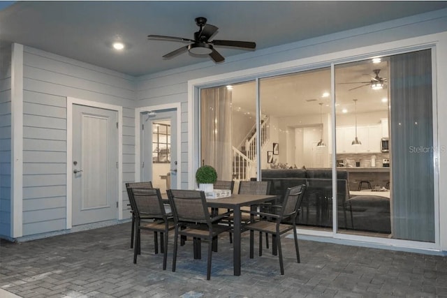4254 Lana Ave, Davenport, FL 33897 - dining room featuring a ceiling fan and brick patterned flooring