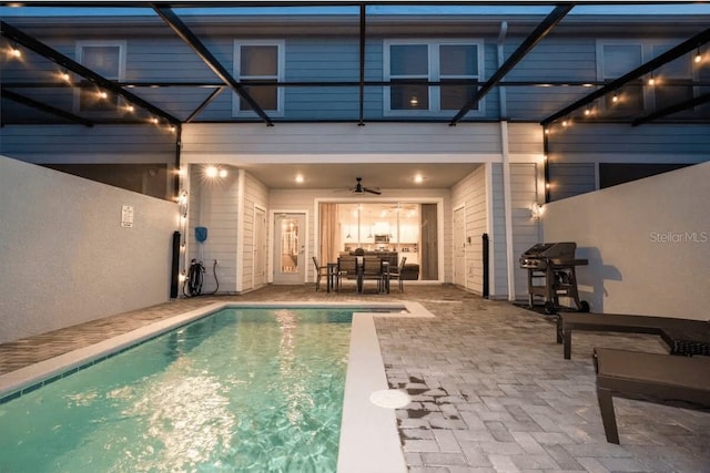 4254 Lana Ave, Davenport, FL 33897 - swimming pool featuring a patio area, ceiling fan, and outdoor dining area