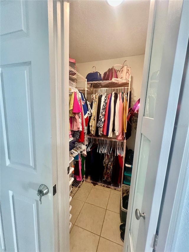 712 Cockatoo Ct, Kissimmee, FL 34759 - spacious closet featuring tile patterned flooring