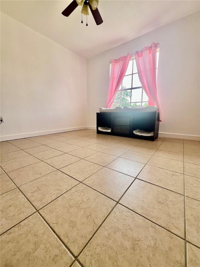 712 Cockatoo Ct, Kissimmee, FL 34759 - living area with tile patterned flooring and ceiling fan
