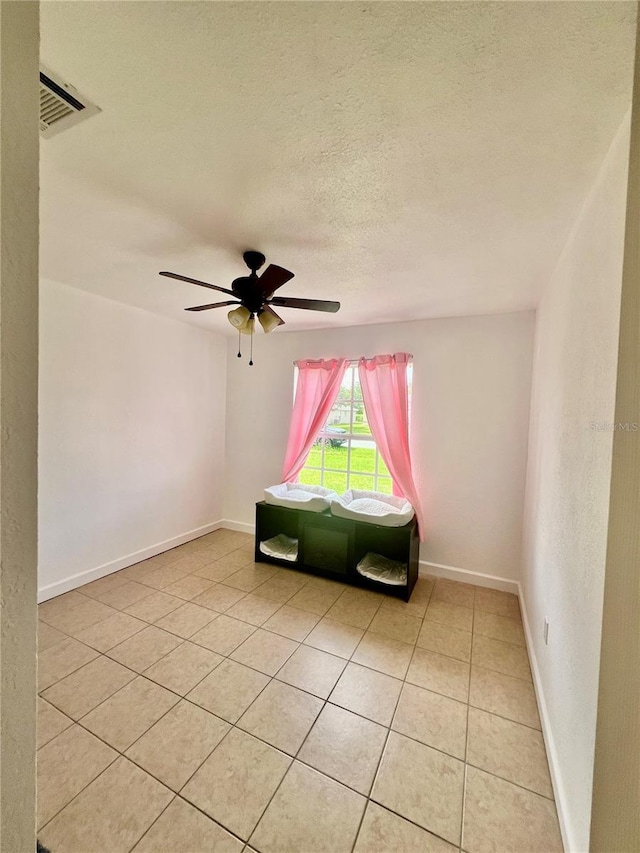 712 Cockatoo Ct, Kissimmee, FL 34759 - unfurnished room featuring light tile patterned floors and ceiling fan