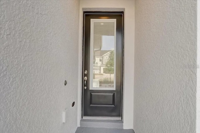 1851 Terrapin Rd, Ocoee, FL 34761 - view of exterior entry with stucco siding