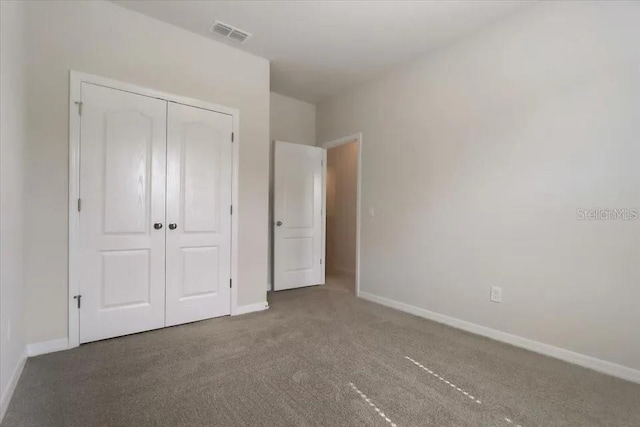 1851 Terrapin Rd, Ocoee, FL 34761 - unfurnished bedroom featuring a closet and carpet flooring