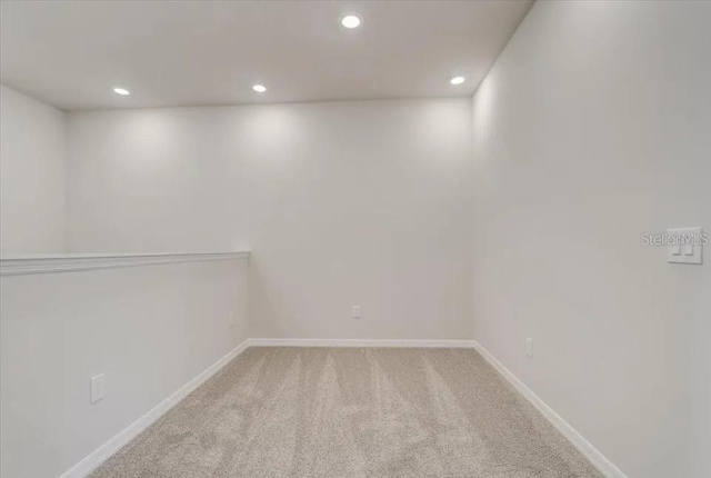 1851 Terrapin Rd, Ocoee, FL 34761 - carpeted empty room with recessed lighting and baseboards