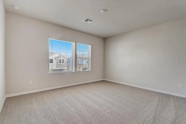1851 Terrapin Rd, Ocoee, FL 34761 - carpeted spare room with baseboards and a smoke detector