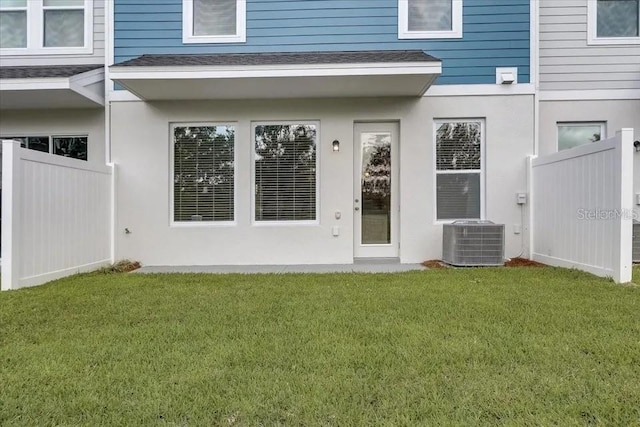 1851 Terrapin Rd, Ocoee, FL 34761 - back of property featuring a shingled roof and stucco siding