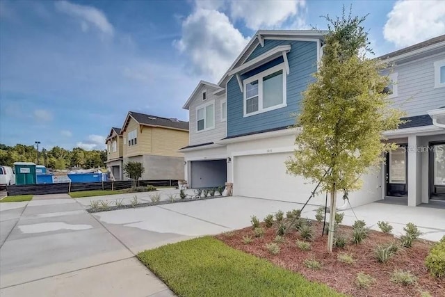 1851 Terrapin Rd, Ocoee, FL 34761 - view of home's exterior featuring an attached garage and concrete driveway