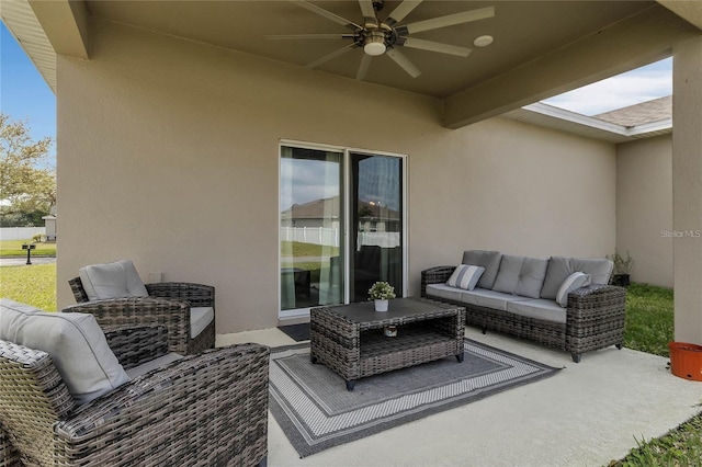 2661 Grasmere View Pkwy, Kissimmee, FL 34746 - view of patio / terrace featuring an outdoor living space and a ceiling fan