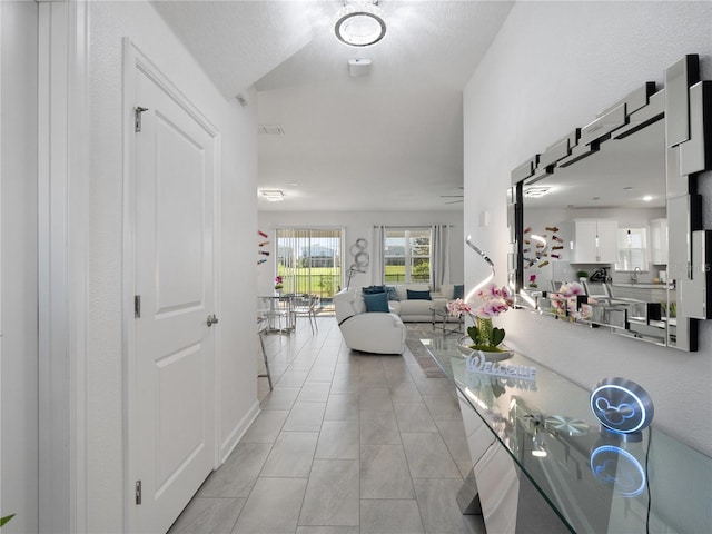 681 Pebble Beach Dr, Davenport, FL 33896 - entrance foyer with light tile patterned floors