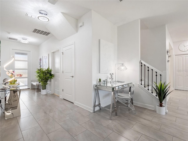 681 Pebble Beach Dr, Davenport, FL 33896 - foyer entrance with stairs and baseboards