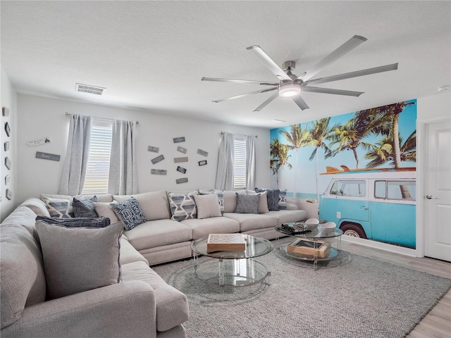 681 Pebble Beach Dr, Davenport, FL 33896 - living area with wood finished floors and ceiling fan