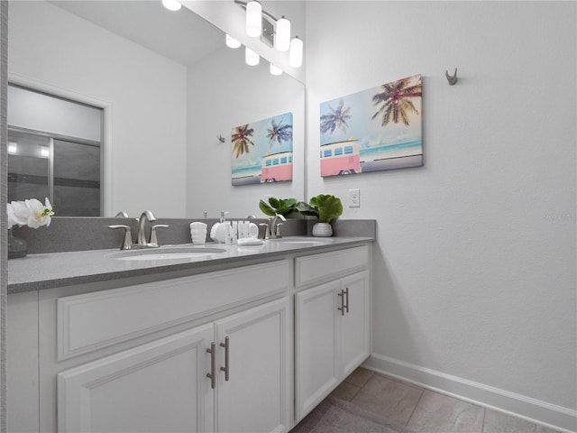 681 Pebble Beach Dr, Davenport, FL 33896 - bathroom featuring double vanity and tile patterned flooring