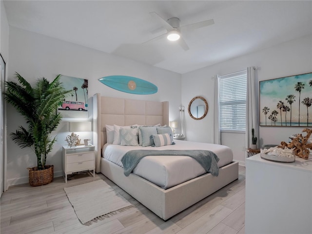 681 Pebble Beach Dr, Davenport, FL 33896 - bedroom featuring light wood-type flooring and ceiling fan