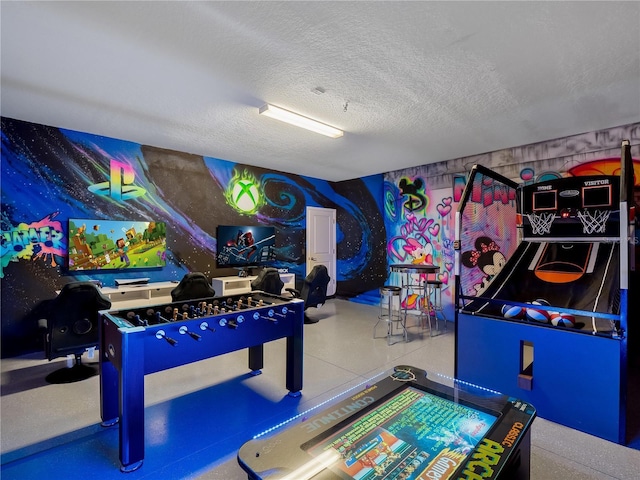 681 Pebble Beach Dr, Davenport, FL 33896 - recreation room with a textured ceiling and wallpapered walls