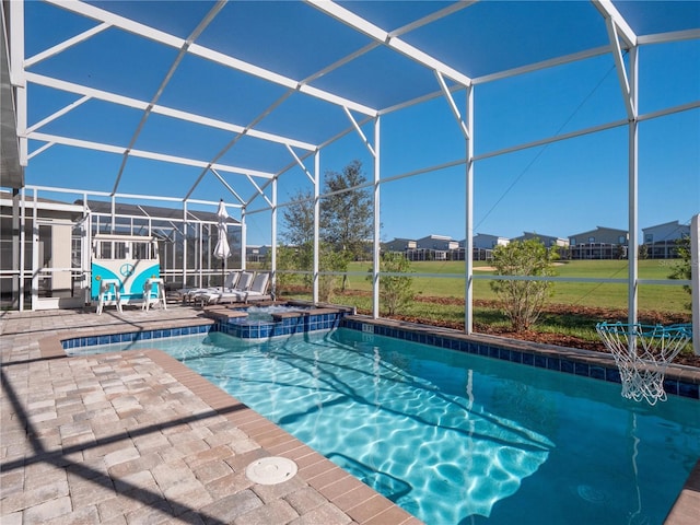 681 Pebble Beach Dr, Davenport, FL 33896 - view of swimming pool with a patio area, a lanai, and a pool with connected hot tub