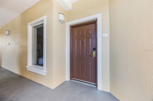 8774 Worldquest Blvd Unit 7404, Orlando, FL 32821 - property entrance featuring stucco siding