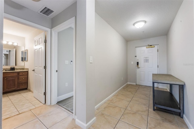 8774 Worldquest Blvd Unit 7404, Orlando, FL 32821 - foyer featuring light tile patterned floors