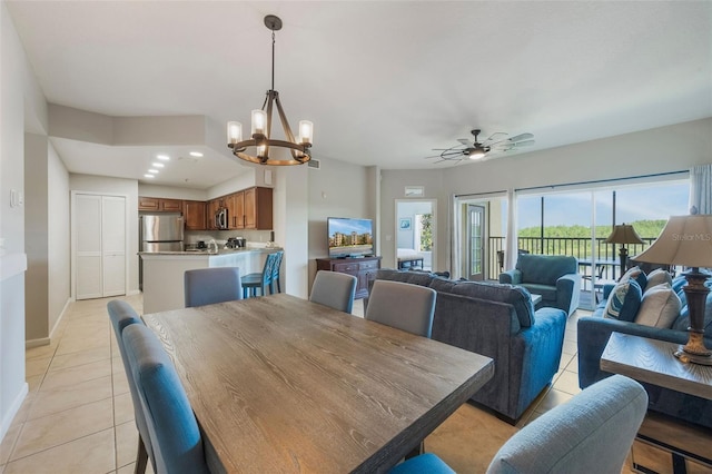 8774 Worldquest Blvd Unit 7404, Orlando, FL 32821 - dining space with light tile patterned floors, a chandelier, and ceiling fan