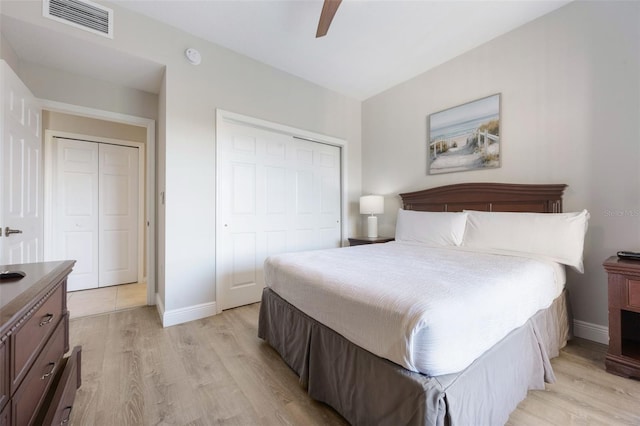 8774 Worldquest Blvd Unit 7404, Orlando, FL 32821 - bedroom featuring a closet, light wood-style floors, and ceiling fan