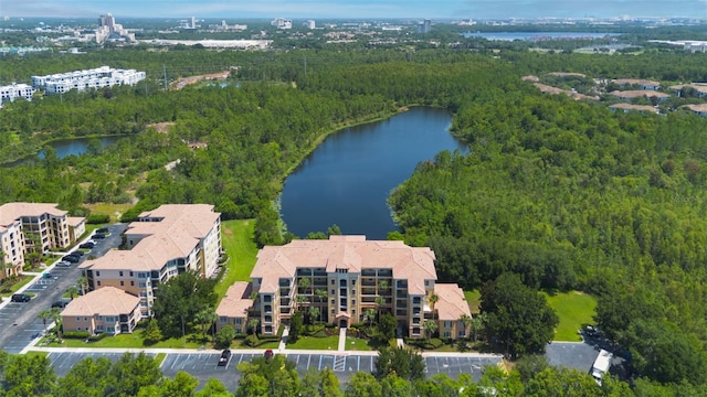 8774 Worldquest Blvd Unit 7404, Orlando, FL 32821 - aerial view of property and surrounding area with a large body of water and a heavily wooded area