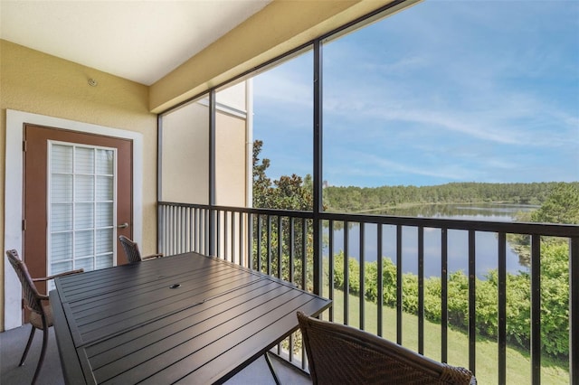 8774 Worldquest Blvd Unit 7404, Orlando, FL 32821 - sunroom / solarium featuring a water view