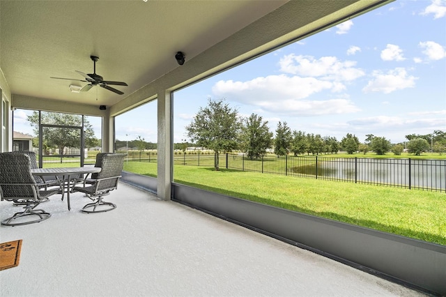 1817 Westerham Ave, Saint Cloud, FL 34771 - sunroom / solarium with a water view, ceiling fan, and outdoor dining space