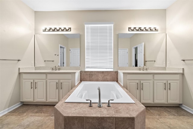 1817 Westerham Ave, Saint Cloud, FL 34771 - bathroom with two vanities and a bath