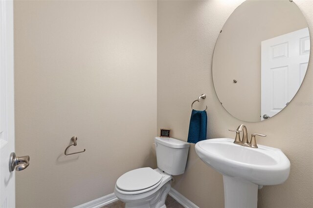 1817 Westerham Ave, Saint Cloud, FL 34771 - half bath featuring toilet and baseboards