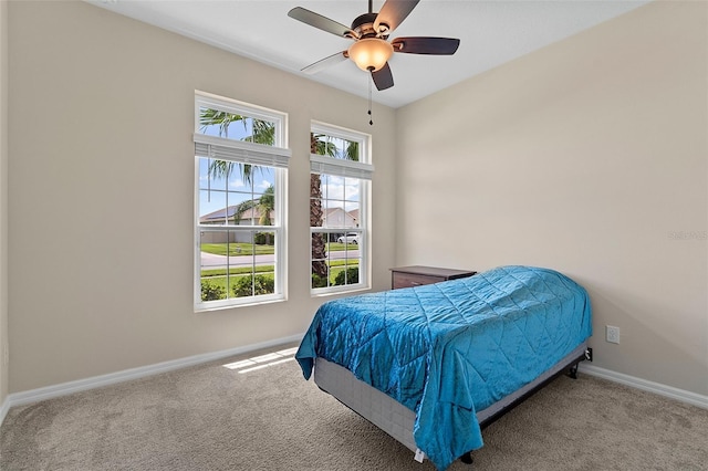 1817 Westerham Ave, Saint Cloud, FL 34771 - carpeted bedroom featuring baseboards and ceiling fan