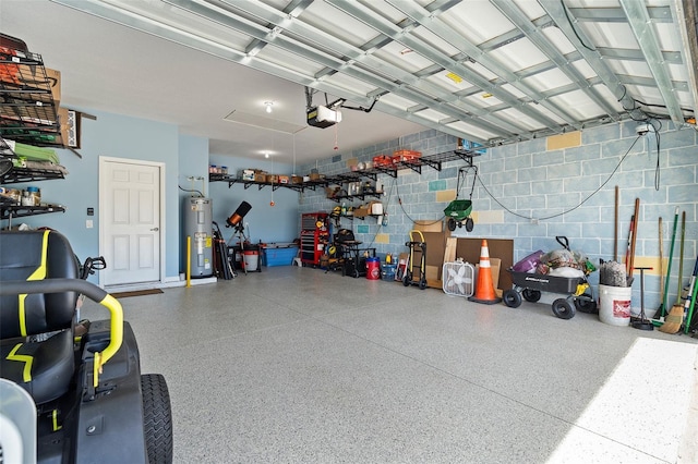 1817 Westerham Ave, Saint Cloud, FL 34771 - garage with electric water heater, a garage door opener, and concrete block wall