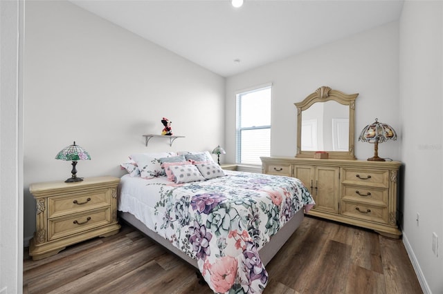 2000 Goblet Cove St, Kissimmee, FL 34746 - bedroom featuring dark wood-style floors and vaulted ceiling