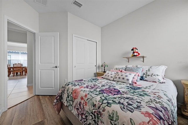 2000 Goblet Cove St, Kissimmee, FL 34746 - bedroom featuring wood finished floors and a closet