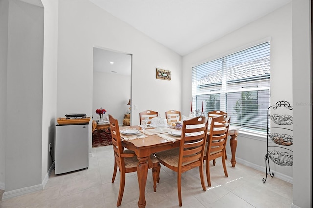 2000 Goblet Cove St, Kissimmee, FL 34746 - dining room featuring lofted ceiling and light tile patterned flooring