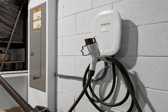2000 Goblet Cove St, Kissimmee, FL 34746 - detailed view of electric panel, concrete block wall, and car charger