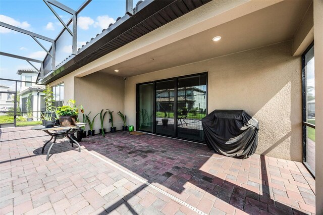 2000 Goblet Cove St, Kissimmee, FL 34746 - view of patio / terrace featuring a lanai and a grill